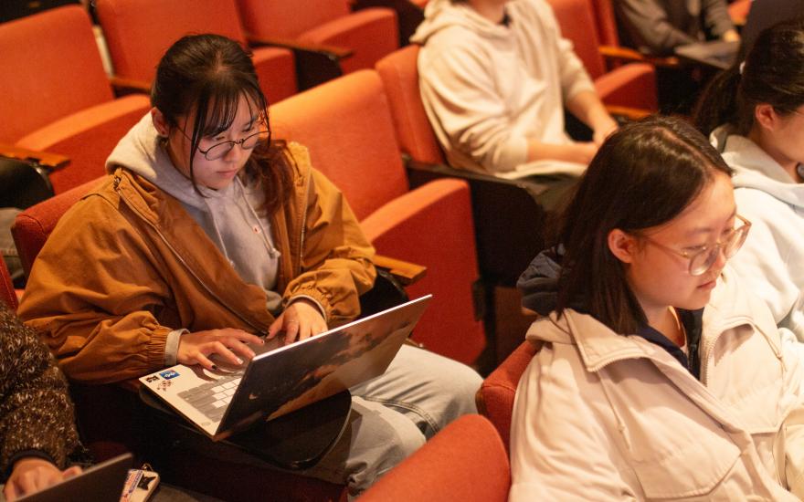 Students in a computer science classroom